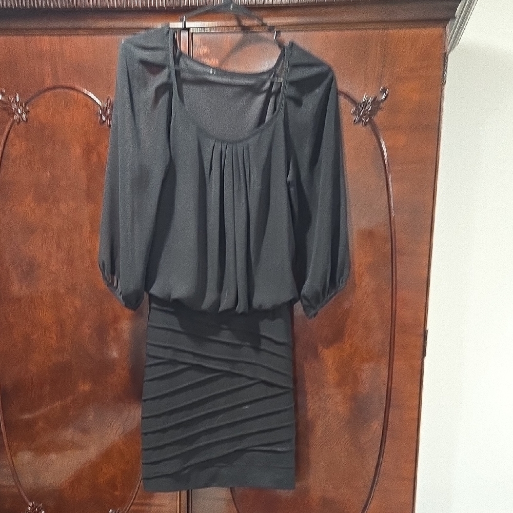 Elegant Black Dress with Draped Skirt